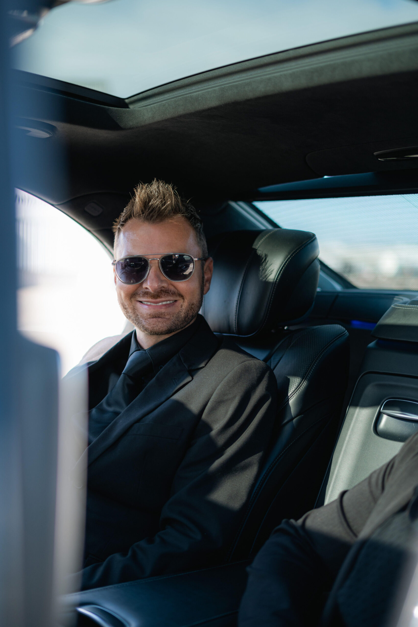 Luxurious executive car interior highlighting premium amenities and comfort for clients