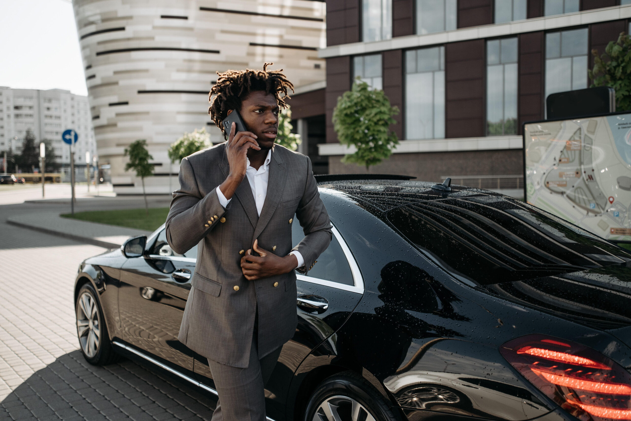 Professional chauffeur providing service at London airport